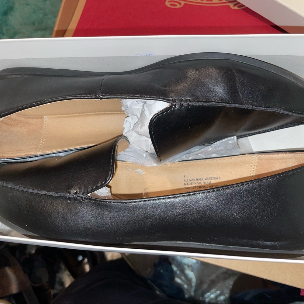 Woman’s slip on flats Size 8